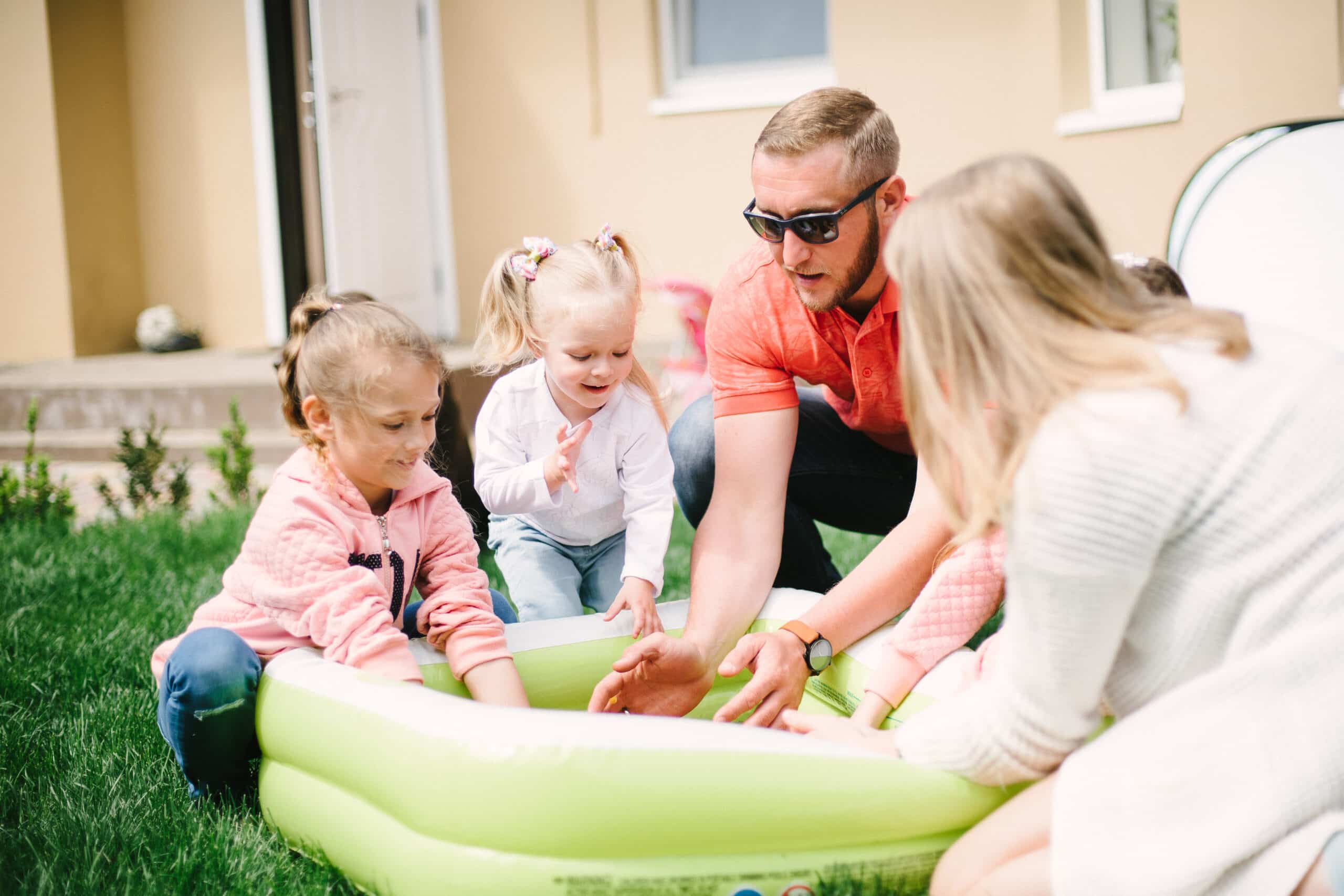 Close-up view of low-profile misting nozzles tucked beneath a wooden pergola in a Helena, AL outdoor living area